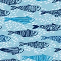 Seamless pattern with cute doodle sardines in the water